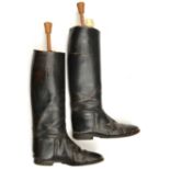 A pair of black leather cavalry boots, complete with wooden trees. GC (surface of leather a little