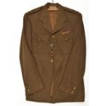 A WWII Coldstream Guards officer’s khaki service dress jacket, brass regimental buttons, “Hawkes”