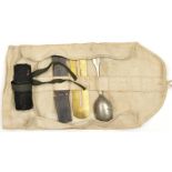 An RA OR’s buff canvas kit roll, containing “housewife” roll, WM dessert spoon and brass button
