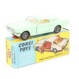 A scarce Corgi Toys Ford Mustang Fastback 2+2 (320). An example in light green with cream interior