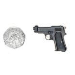 A well engineered non working miniature model of an Italian 9mm Model 1934 Beretta automatic pistol,