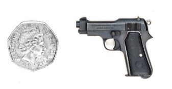 A well engineered non working miniature model of an Italian 9mm Model 1934 Beretta automatic pistol,