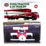 6 unmade plastic vehicle kits. A Revell 1:24 Ferrari F1 Team Iveco truck and racing trailer. 2x