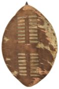 A small Zulu hide shield, 20” overall, with wooden pole and small loop handle. GC, appears to have