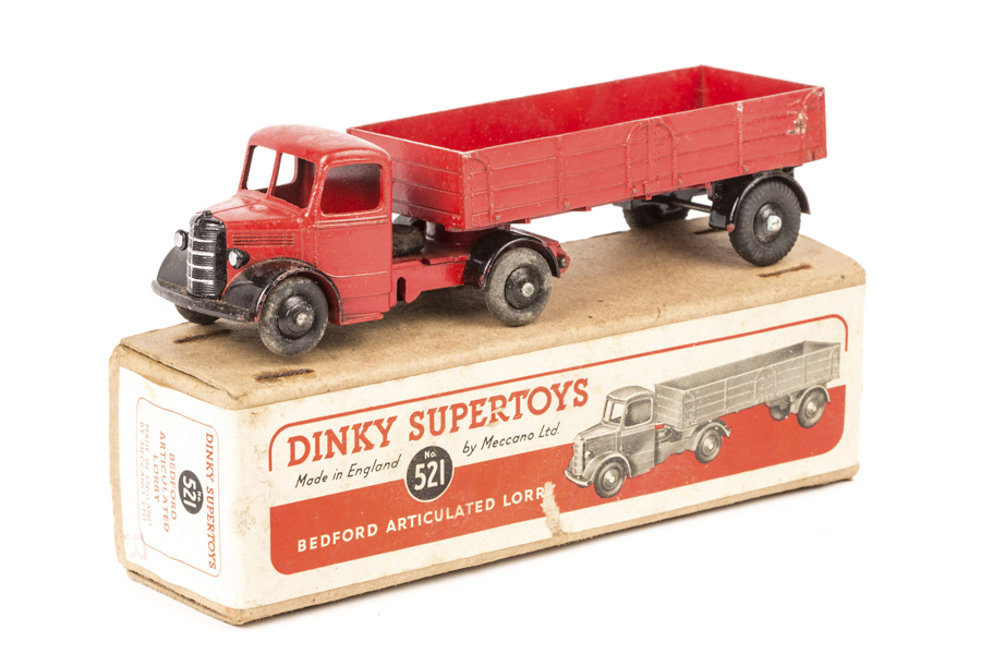 A Dinky Supertoys Bedford Articulated Lorry (521). An example with red cab and body with black wings