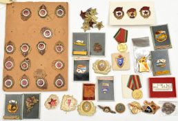 A large quantity of Soviet military badges, mostly screw back types. GC