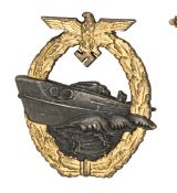 A Third Reich 2nd pattern E boat badge, by Schwerin, of heavy zinc with gold lacquered wreath and