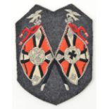 A scarce Third Reich Luftwaffe Standard Bearer’s bullion embroidered arm patch, on dark grey cloth