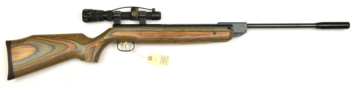 A .22” Weihrauch HW95 break action air rifle, number 1464679, with laminated striped wood stock