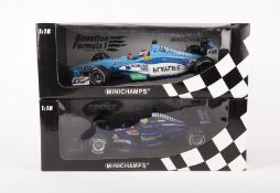2 Minichamps 1:18 scale F1 racing cars. A Benetton F1 Playlife B199 1999, RN10, in two-tone blue and