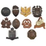 11 Canadian OTC cap badges: Montreal, W Ontario, N Brunswick, Acadia, Mount Alison (lugs missing),