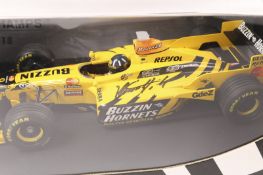 A very limited issue Minichamps 1:18 Jordan Honda F1 racing car. In yellow/black livery, RN9 Damon