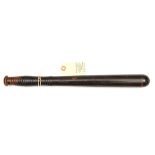 A 19th century varnished turned wood truncheon, ribbed grip. GC