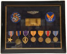 USA: An interesting framed display of 7 awards comprising: Silver Star, Air medal with leaf cluster,
