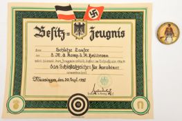 A Third Reich shooting certificate, awarded to Schutze Laufer of “8.M.G. Komp. I.R. Heilbronn”,