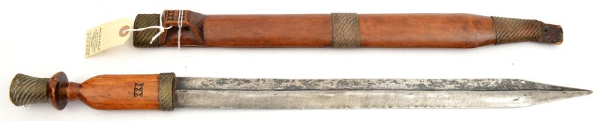 An African Shona shortsword, made for the tourist trade, blade 19”, the hilt and scabbard of pale
