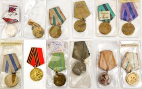 12 different Soviet Russian medals WWII Liberation and Service medals. GC