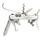 A coachman’s clasp knife, with blades, bootlace hooks, pair studs for repairing straps, corkscrew,