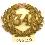 An OR’s 1874 pattern brass glengarry badge of The 34th (Cumberland) Regt, “34” in wreath (479),