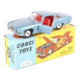 A Corgi Toys Ghia L.6.4 (241). An example in metallic blue with red interior. Boxed, minor wear,