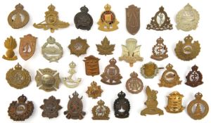 32 Canadian artillery engineers, corps, etc cap badges. Generally GC (few fastenings AF) Part I of