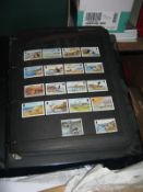 Another lot of stamps and First Day covers, including folders of Isle of Man, Eire, St Kilda,