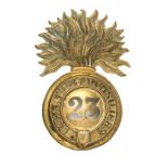 An OR’s 1874 pattern brass glengarry badge of The 23rd (R Welsh Fusiliers) Regt, (456), copper lugs.