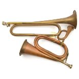 A brass cavalry trumpet, a copper infantry bugle and a miniature bugle, all complete with