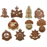 10 pre 1950 Canadian cap/glengarry badges: Fus Mont Royal grenade, Regt de Chateauguay, Regt de