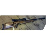 A .22” AGS-PR1 compressed air air rifle, number 00902, the beech wood stock having chequered fore