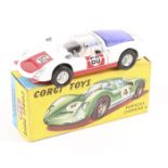 A Corgi Toys Porsche Carrera 6 (330). In white with red panels, RN60 with blue rear window. Boxed,