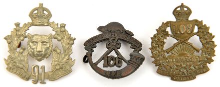 3 Militia cap badges: WM KC 91st Highlanders, brass KC 103rd Calgary Rifles and blackened 106th