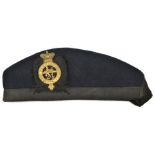 A scarce blue cloth glengarry cap with headband, tails and lining with gilt stamp “Warranted