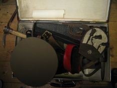 A WWII British entrenching tool, a similar US entrenching tool, a Mannlicher Carcano Mod 1938