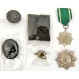 A Third Reich Eastern Peoples Award, 1st class with swords in silver, a similar 2nd class with