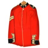 A good Coldstream Guards corporal’s tunic dated 1957, anodised regimental buttons, Guards pattern