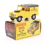 A scarce Budgie Toys AA Land Rover – with windows (268). In yellow with black roof, spare wheel to