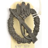 An identical badge, originally bronzed (?) and with no trace of maker’s mark. GC