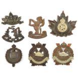 7 Canadian cap/glengarry badges: 16th Light Horse (lugs missing), Cape Breton Highlanders, Peel &