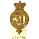 An OR’s 1874 pattern brass glengarry badge of The 31st (Huntingdonshire) Regt. crowned strap type (