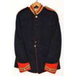 A post 1953 Royal Horse Guards trooper’s tunic, blue with scarlet facings, gold lace trimmed,