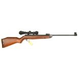A .22” Webley Vulcan break action air rifle, number 561738, with walnut stock and rubber heel,
