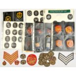 Approx 35 British cloth insignia, including divisional signs, remainder mostly trade badges;