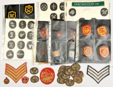 Approx 35 British cloth insignia, including divisional signs, remainder mostly trade badges;