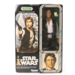 A Star Wars 1977 Kenner 12 inch action figure of Han Solo. The figure is complete with all