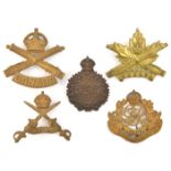 5 CEF cap badges: Machine Gun Corps (45-1-3 and 45-1-9), Mil Police (60-1-1B lugs missing), PT