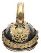 A late 19th century Austrian Dragoon officer’s helmet, black lacquered skull gilt washed peak