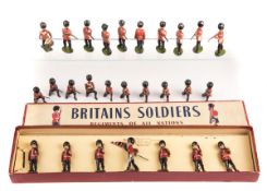 A Britains set Colours & Pioneers of the Scots Guards set No.82. 7 figures, Standard Bearer and 6