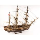 A model of a French man of war from 1785, Le Superbe. A detailed wooden kit built model with 3