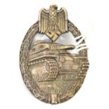 A Third Reich Panzer Assault badge in silver, plated on white metal with solid flat back, wide hinge